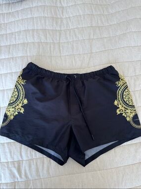 Versace beachwear with Baroque print